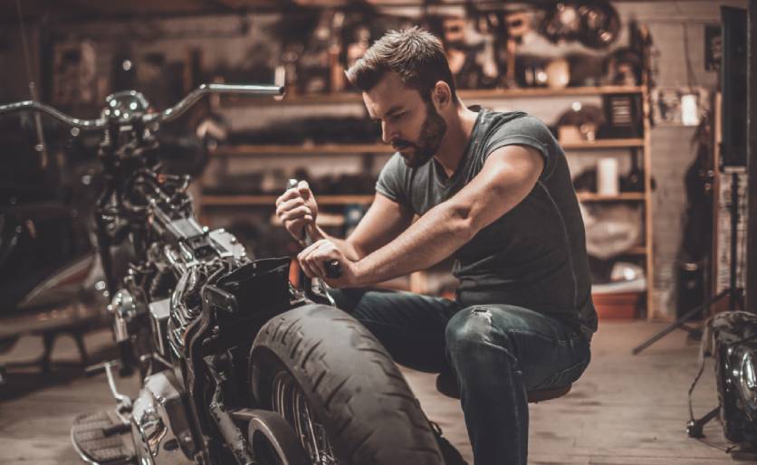 MX - article 1140x700 - man fixing motorbike.jpg